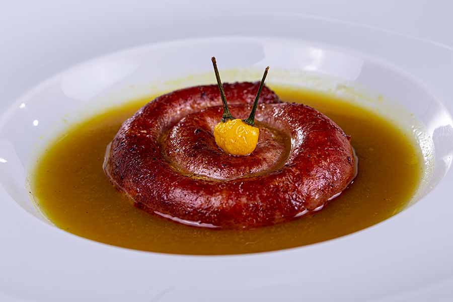 Linguiça assada com molho de tucupi picante